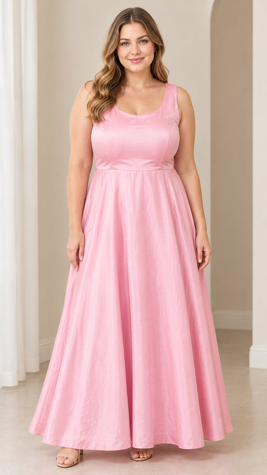 Front full-length view of woman wearing pink sleeveless scoop neck A-line maxi dress