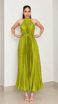 Front view of woman wearing chartreuse green pleated halter neck maxi dress