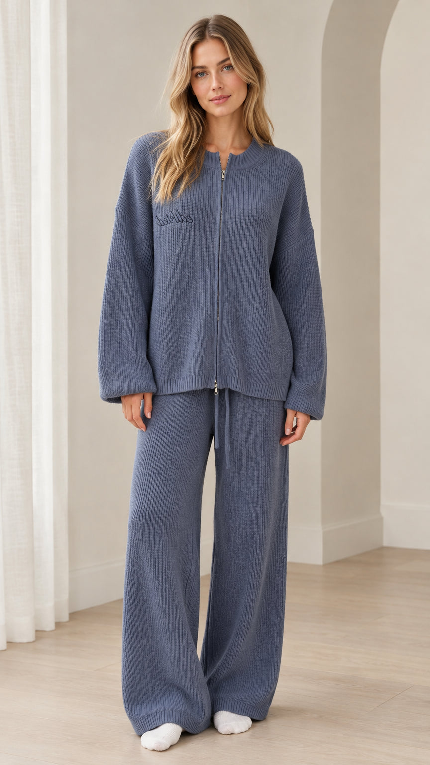 Front full view of woman wearing Dusty Blue ribbed knit zip cardigan and wide leg lounge pants set
