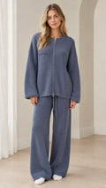 Front full view of woman wearing Dusty Blue ribbed knit zip cardigan and wide leg lounge pants set
