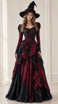 Front view of woman wearing burgundy and black gothic skeleton witch ball gown with matching hat