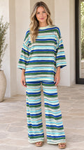 Front view of model wearing blue and green striped ribbed knit two-piece set