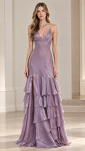 Front full-length view of a woman wearing a lilac tiered ruffle evening gown with spaghetti straps