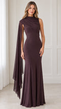 Front view of model wearing a plum high neck evening maxi dress with flowing asymmetric cape drape