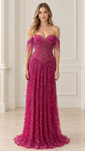 Front view of model wearing magenta beaded corset evening gown with off-shoulder tassel sleeves