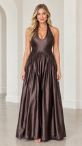Model wearing a chocolate brown satin halter plunging V-neck maxi evening gown front view