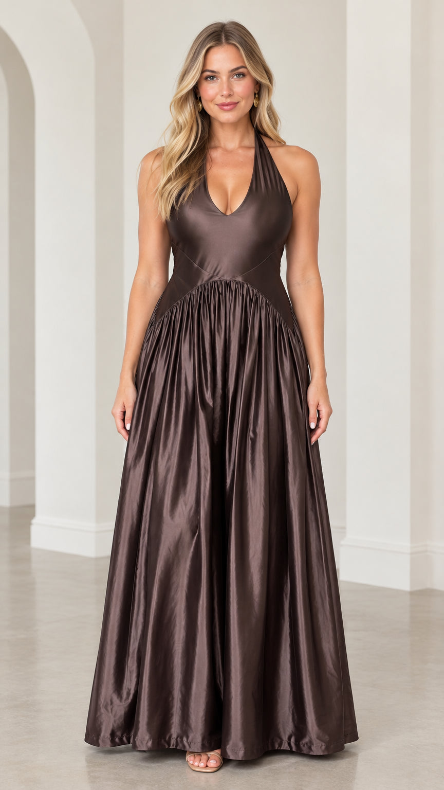 Model wearing a chocolate brown satin halter plunging V-neck maxi evening gown front view