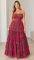 Front view of model wearing magenta floral strapless bustier tiered maxi dress