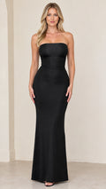 Front full-length view of model wearing black strapless lace-up back maxi evening gown