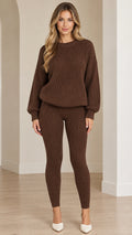 Front full-length view of woman wearing brown ribbed knit sweater and leggings set