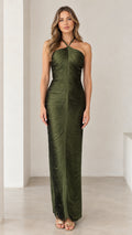 Front full-length view of woman wearing olive green halter ruched maxi dress