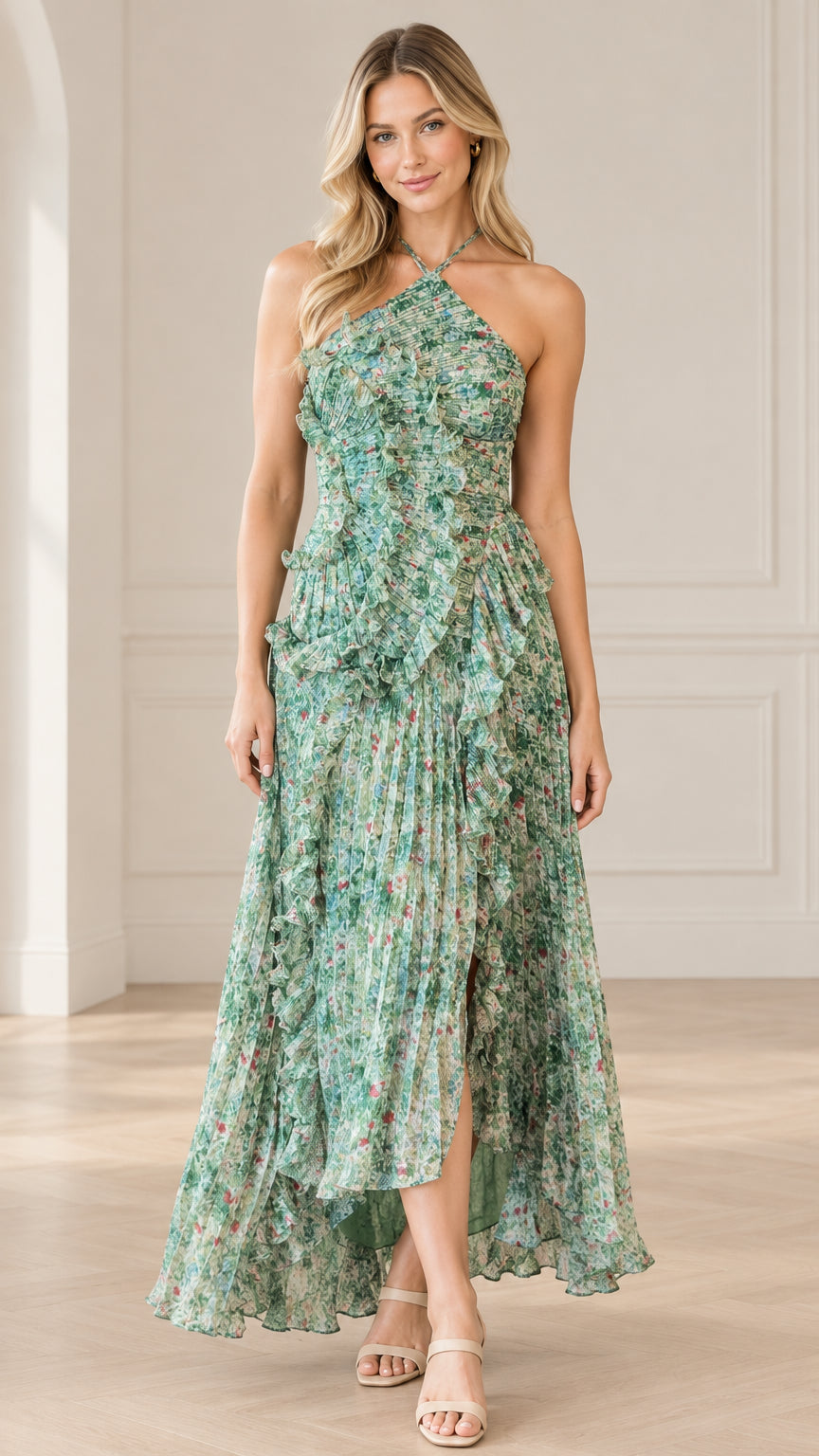 Front full-length view of model wearing sage green floral halter pleated maxi dress