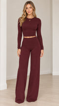 Full front view of women's burgundy long sleeve crop top and wide leg pants set