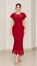 Front view of woman wearing red short sleeve scalloped lace mermaid dress