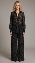 Full front view of model wearing black sequin lace button-down shirt and matching wide-leg trousers