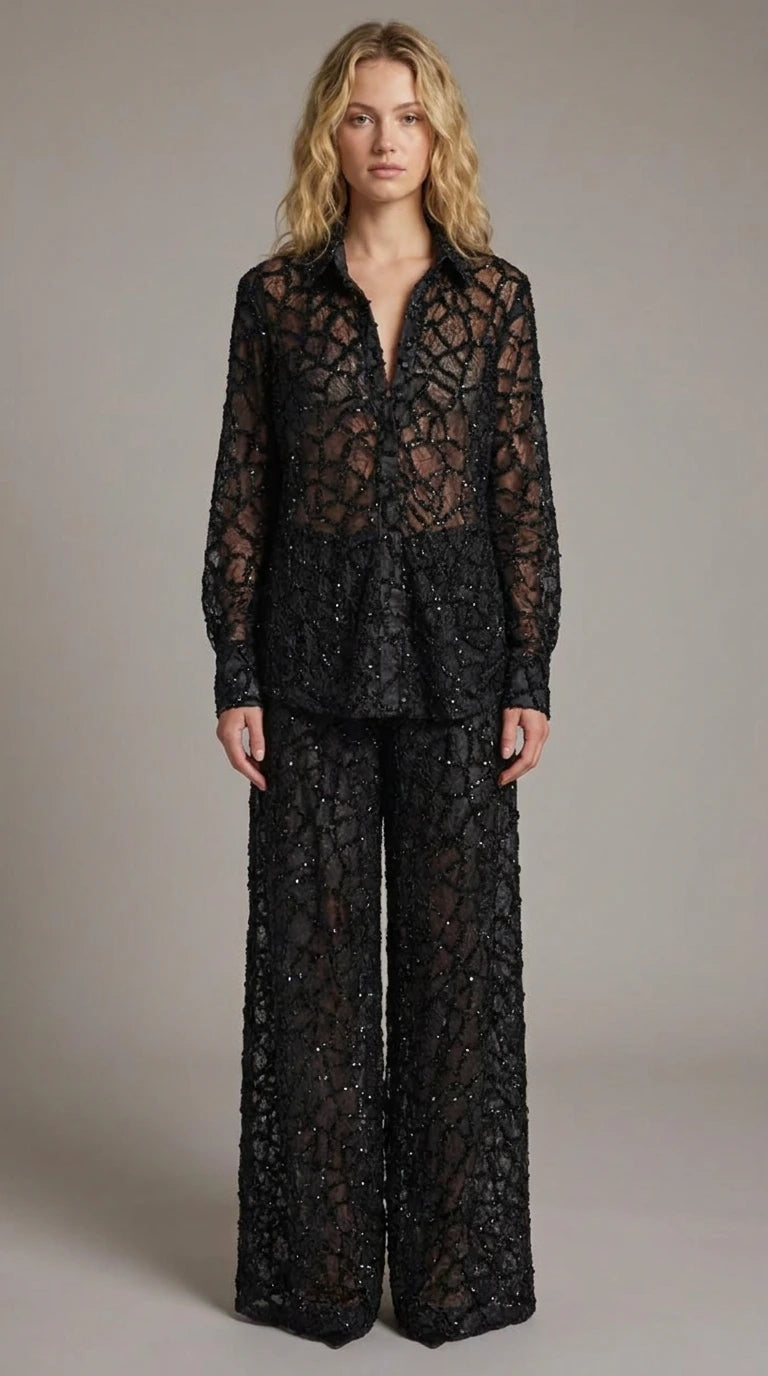 Full front view of model wearing black sequin lace button-down shirt and matching wide-leg trousers