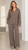 Front full view of woman wearing brown striped V-neck long sleeve top and matching wide leg pants