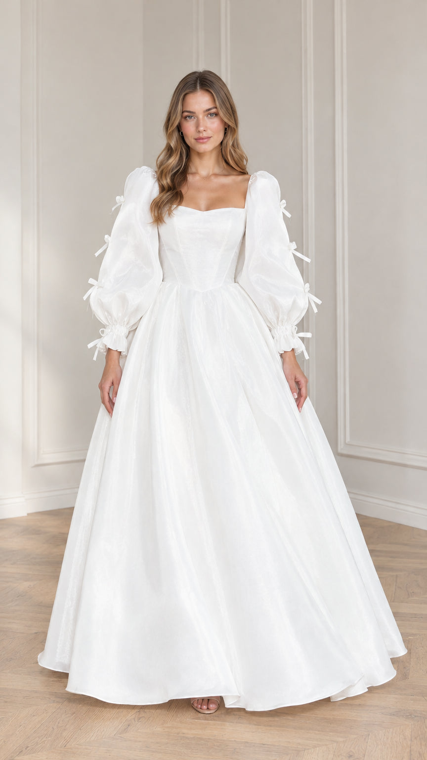 Front view of model wearing white square neck puff sleeve corset ballgown maxi dress