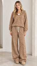 Front view of model wearing camel leopard print hooded sweatshirt and wide-leg lounge pants set