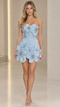 Front full-length view of woman in light blue strapless 3D floral corset mini dress