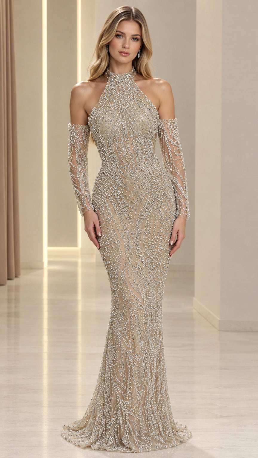 Full front view of Champagne halter beaded mermaid evening gown with cold shoulder sleeves