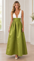 Front view of model wearing olive green and white deep V-neck pleated A-line maxi evening gown