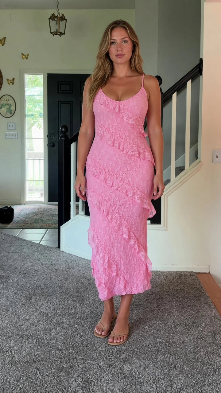 Front view of woman wearing pink floral lace asymmetrical ruffle cami midi dress