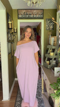 Front view of model wearing lavender one-shoulder casual maxi dress