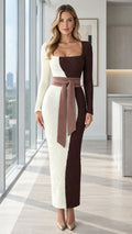Front view of model wearing brown and cream textured colorblock maxi dress with square neckline and waist tie
