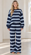Front view of model wearing Navy Blue and sky blue striped crewneck sweatshirt and wide-leg lounge pants set