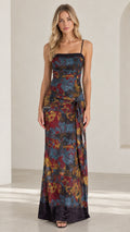 Full front view of model wearing Navy Multi abstract floral maxi dress with knotted waist detail