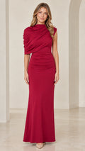 Front view of woman wearing Wine Red asymmetrical draped shoulder ruched maxi evening gown