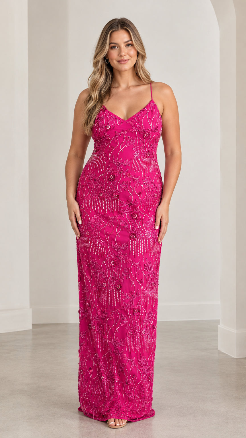Model wearing fuchsia beaded spaghetti strap column maxi evening gown front view
