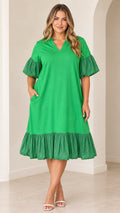 Front view of model wearing green V-neck flutter sleeve midi dress with tiered ruffle hem