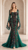 Front view of emerald green square neck mermaid evening gown with floral beadwork and flared bell sleeves