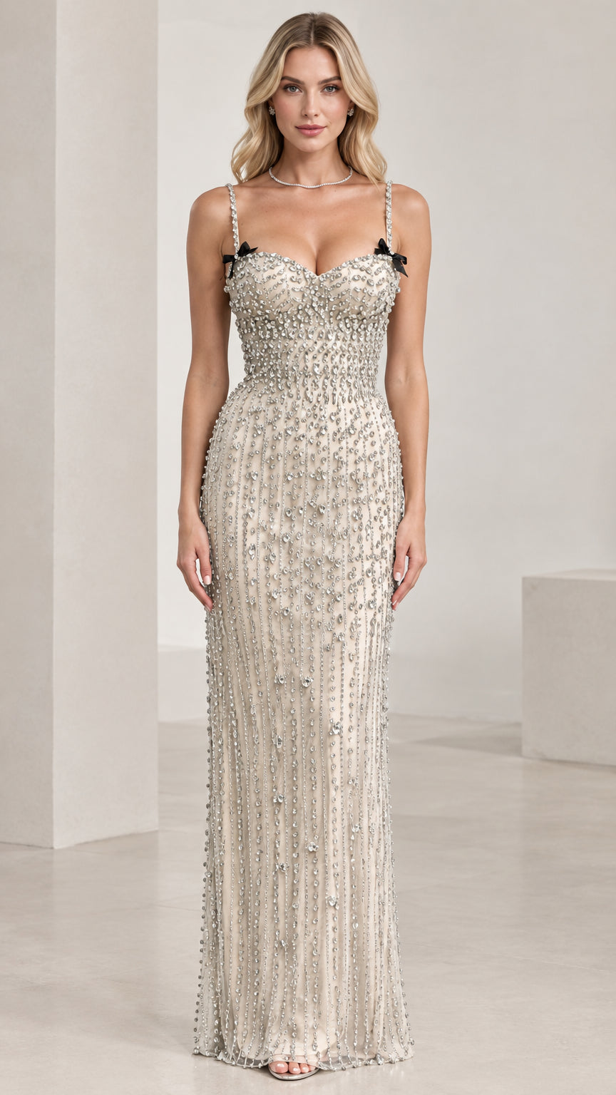 Full front view of Champagne rhinestone sweetheart maxi evening gown with bow straps