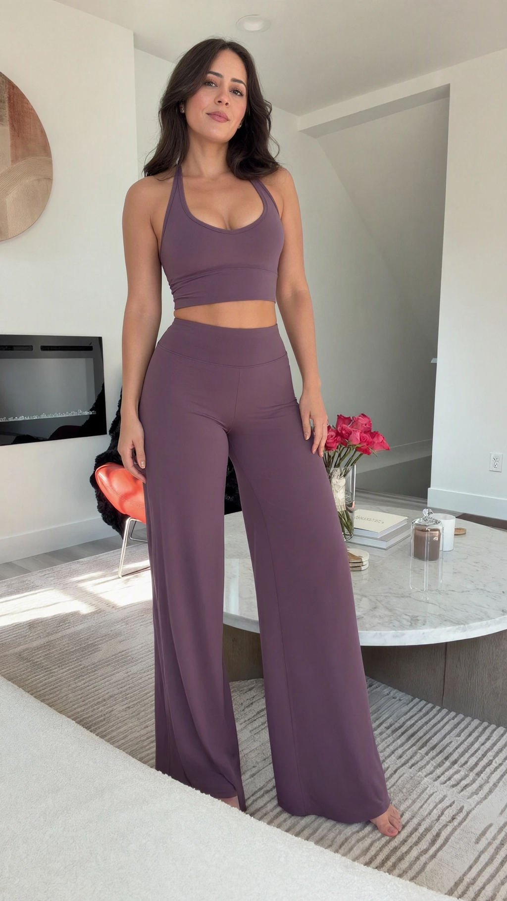 Front view of model wearing dusty mauve racerback crop top and high-waisted wide-leg lounge pants set