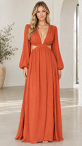 Front view of woman wearing rust orange deep V-neck cutout maxi dress with balloon sleeves