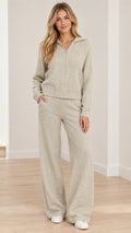 Full front view of model wearing Oatmeal knit zip-up hoodie and wide-leg pants loungewear set