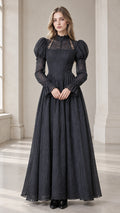 Front full view of black Victorian mock neck puff sleeve lace maxi dress