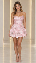 Front view of model wearing pink 3D floral applique corset mini dress with pearl bead centers