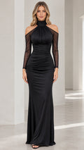 Front view of model wearing black high neck cold shoulder ruched evening maxi dress