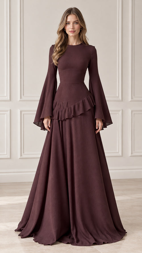 Front full-length view of model wearing burgundy flare sleeve maxi dress with ruffled waist