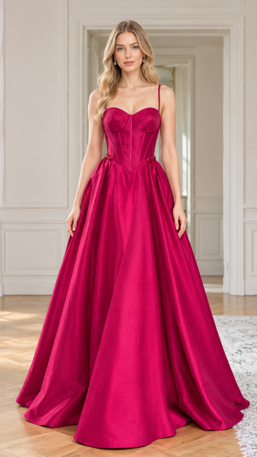 Front full-length view of woman wearing magenta corset ball gown with sweetheart neckline and spaghetti straps
