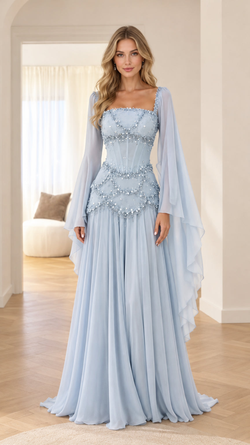Front view of model wearing light blue embellished corset maxi gown with draped cape sleeves