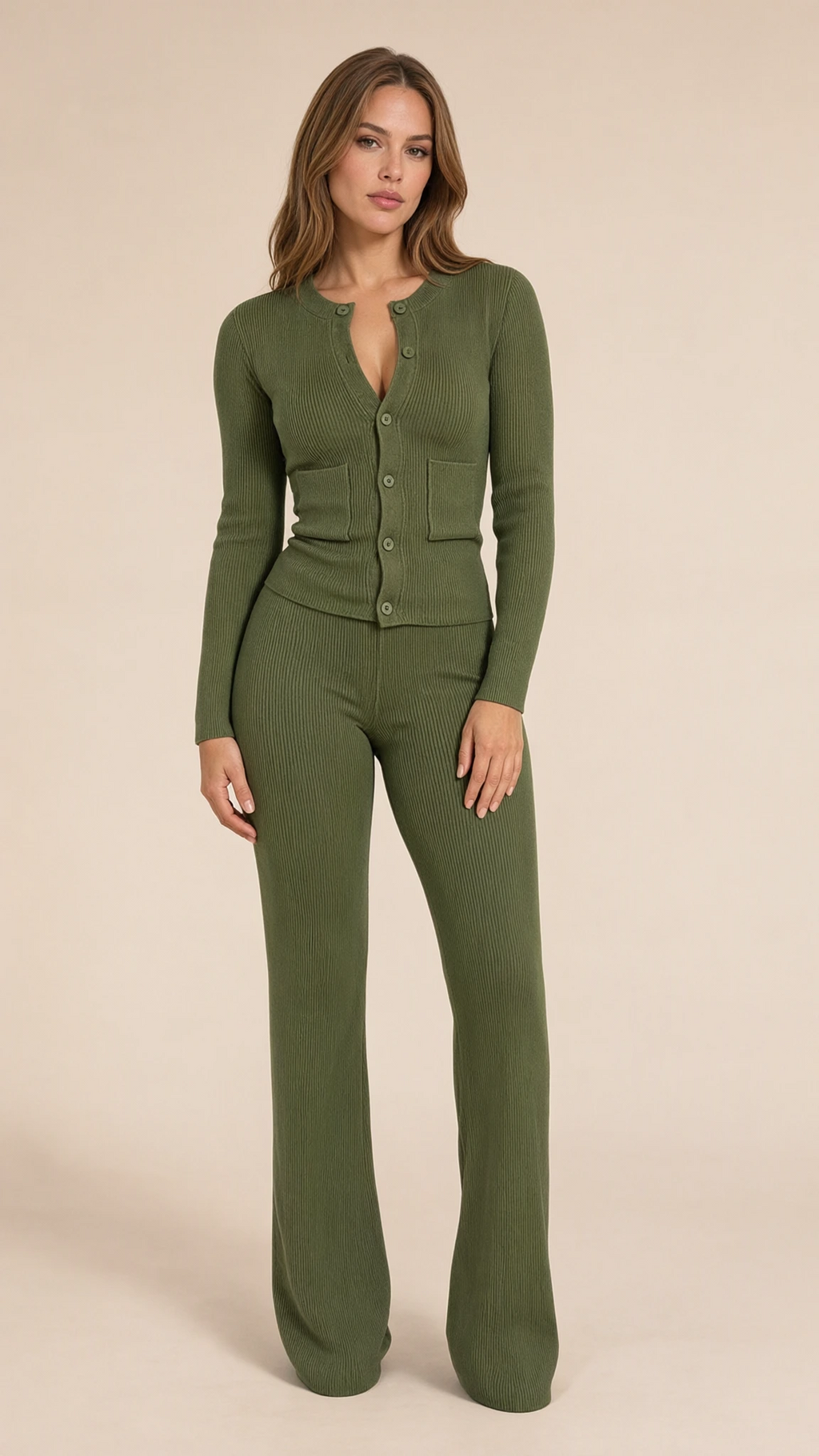 Front view of model wearing olive green ribbed knit button cardigan and flared pants set