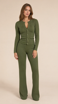Front view of model wearing olive green ribbed knit button cardigan and flared pants set