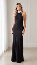 Front view of black halter backless maxi dress with contrast white collar
