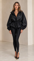 Front view of model wearing black drawstring waist peplum zip-up jacket