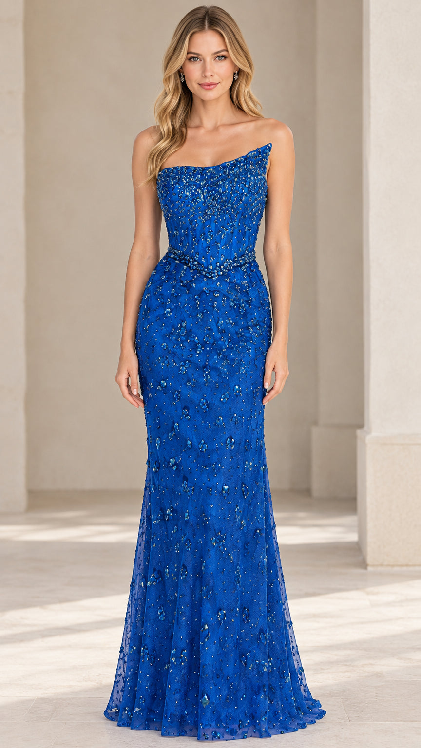 Front view of royal blue beaded strapless evening gown